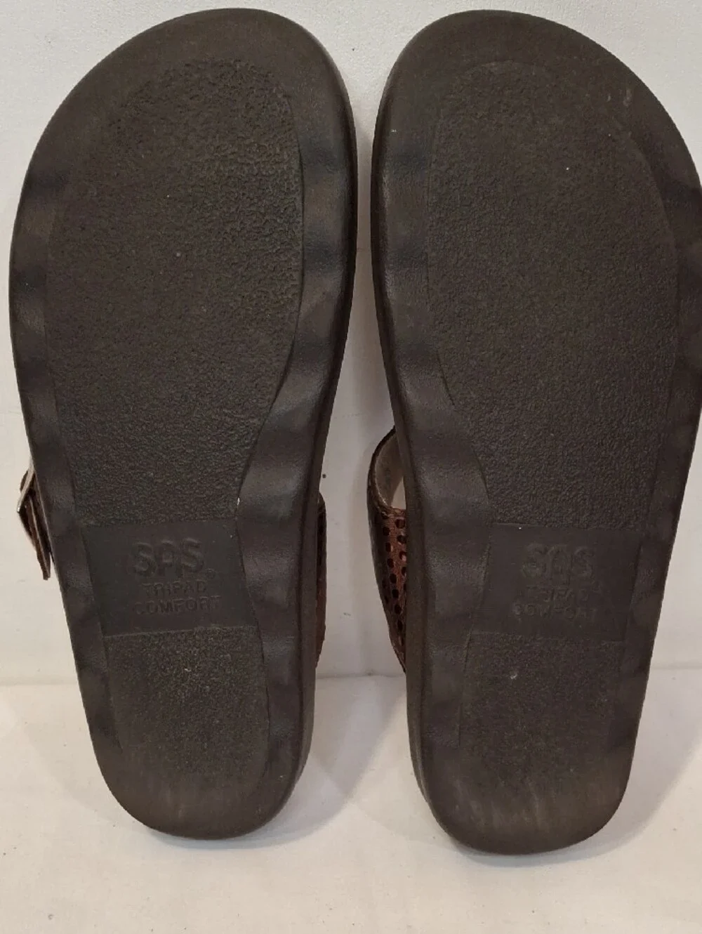 SAS Sanibel Metallic Bronze Gold Thong T Strap Sandals with Gold Buckle Detail.